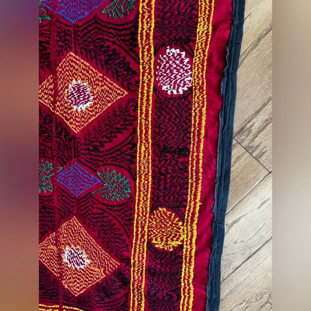 Suzane embroidered with cotton threads on cotton red fabric, hand made